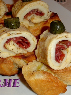 Una foto de Montaditos de rollitos de tortilla