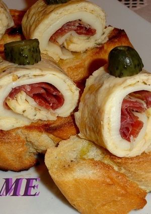 Una foto de Montaditos de rollitos de tortilla