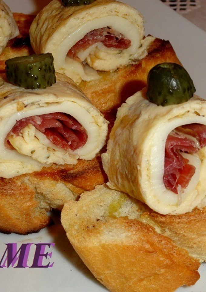 Una foto de Montaditos de rollitos de tortilla