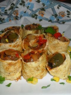 Una foto de Caracolas rellenas de pisto de verduras