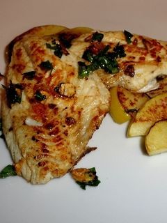 Una foto de Filetes de dorada en cama de manzana a la plancha