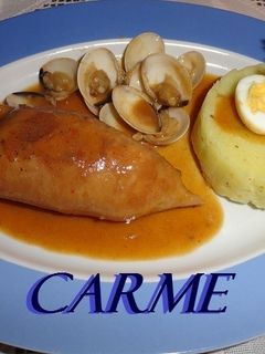 Una foto de Calamares rellenos de langostinos y jamón ibérico