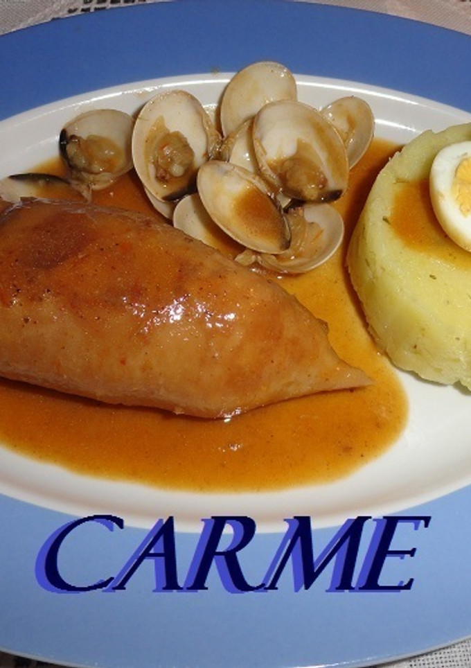 Una foto de Calamares rellenos de langostinos y jamón ibérico
