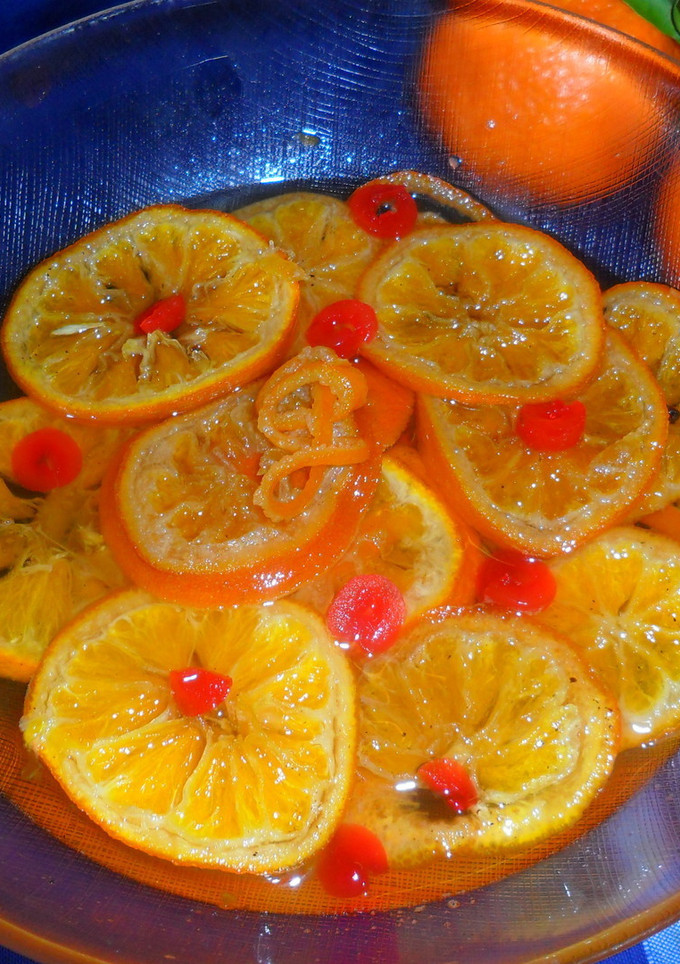 Una foto de Carpaccio de mandarina en almíbar