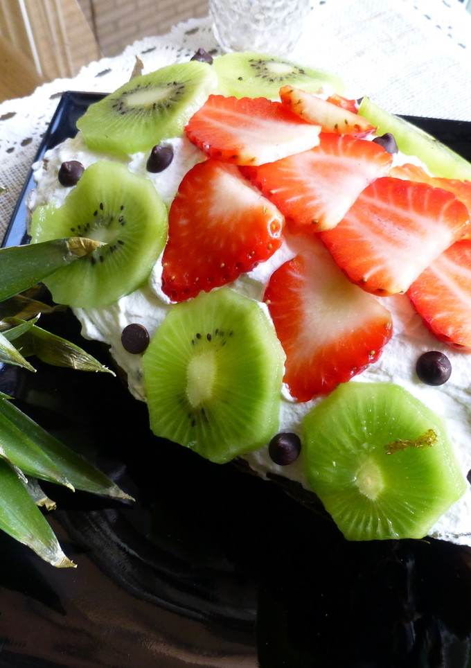 Una foto de Cóctel de frutas con salsa de mango