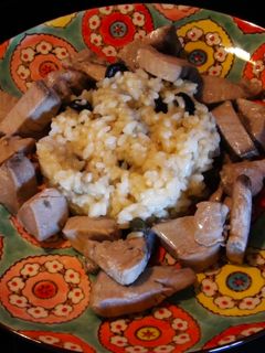 Una foto de Corona de atún menier con risotto de alcaparras y aceitunas