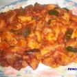 Pisto de verduras, magro de cerdo y patatas fritas