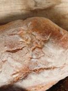 Una foto de Pan de queso y aceitunas