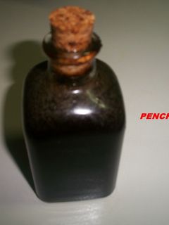 Una foto de Aceite negro superior