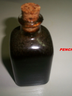 Una foto de Aceite negro superior