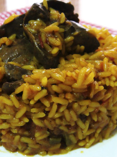 Una foto de Arroz con menudillos de pollo
