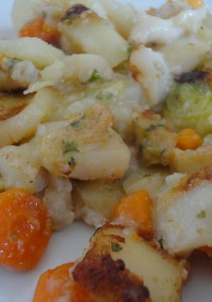 Una foto de Sepia con patatas al horno