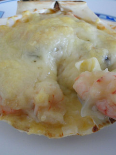 Una foto de Conchas de mejillones y gambas gratinadas