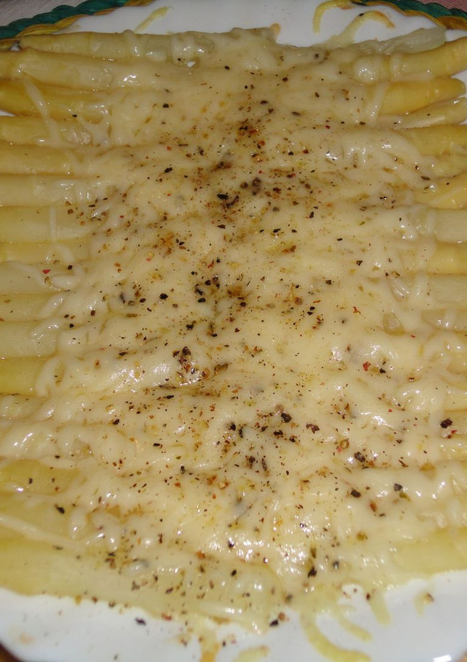 Una foto de Espárragos con emmental a las 5 pimientas