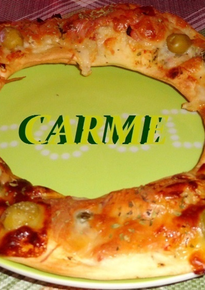 Una foto de Rosca pizza de jamón y quesos