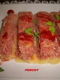 Una foto de Pastel con carne picada, chorizo ibérico y puré de patatas