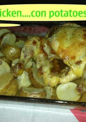 Una foto de Pollo asado con patatas al limón y romero