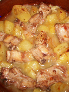 Una foto de Conejo rústido al horno con limón