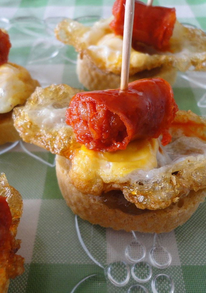 Una foto de Pintxo de txistorra y huevo