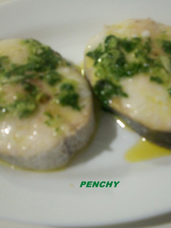 Una foto de Rodajas de merluza al horno, en salsa verde