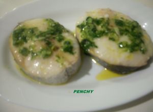 Una foto de Rodajas de merluza al horno, en salsa verde
