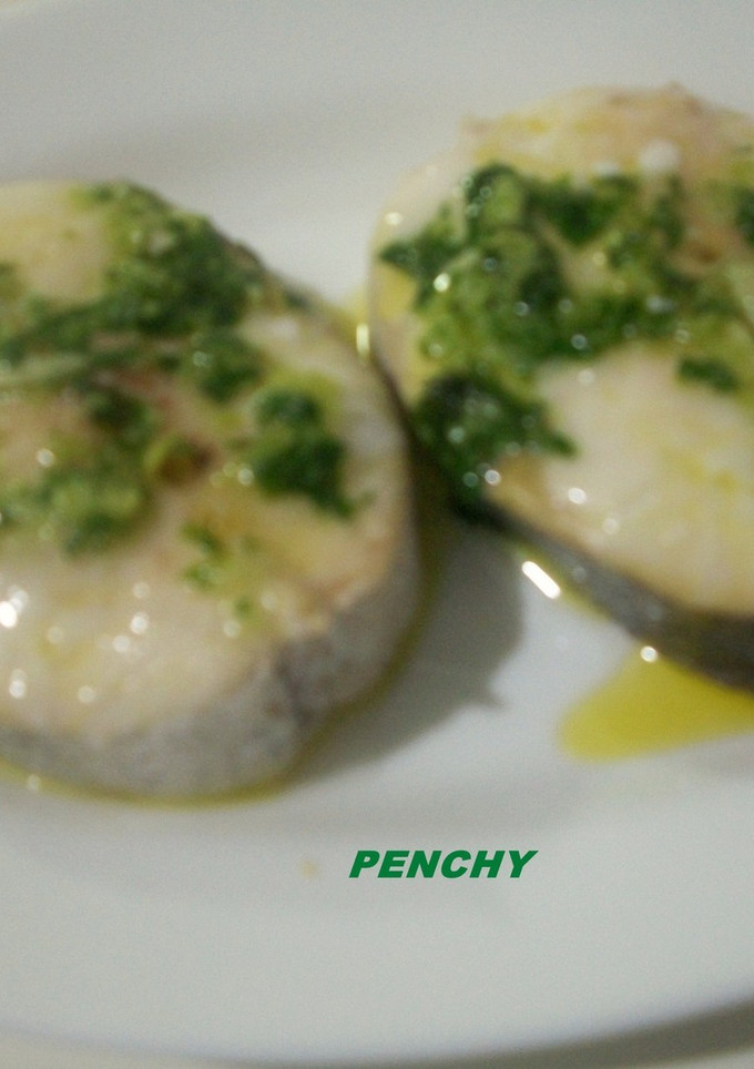 Una foto de Rodajas de merluza al horno, en salsa verde