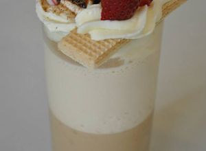 Una foto de Copa de café lactea chocolatosa