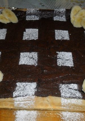 Una foto de Tarta con crema de chocolate y queso