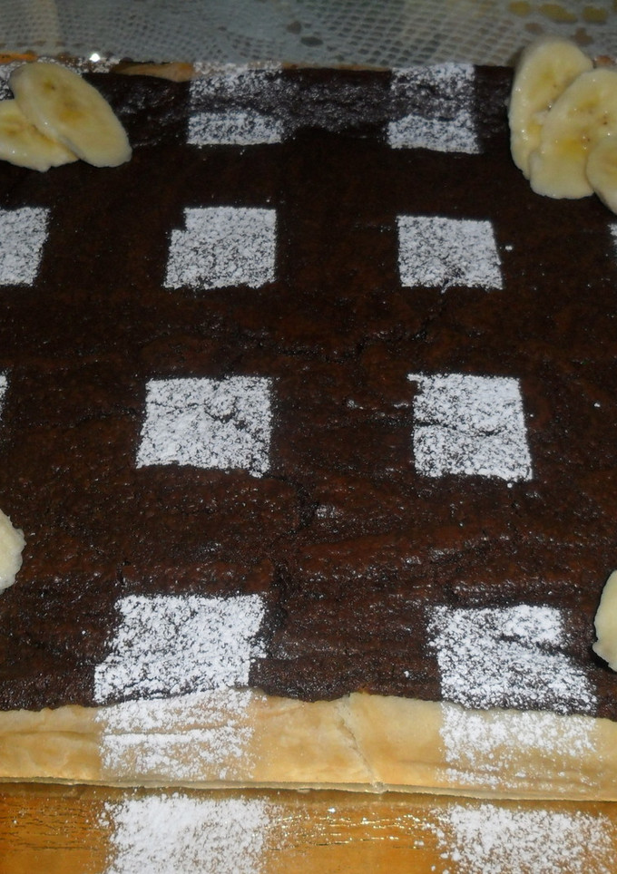 Una foto de Tarta con crema de chocolate y queso