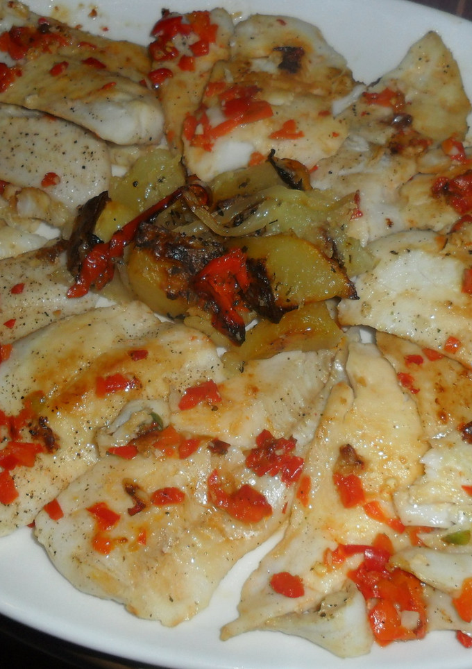 Una foto de Merluza a la plancha con patatas y verduras