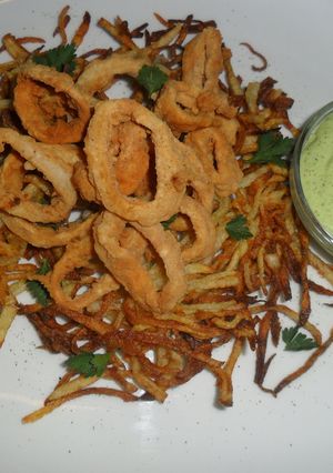 Una foto de Calamares sobre nido de pajas