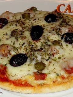 Una foto de Minipizzetta de quesos y lomo ibérico