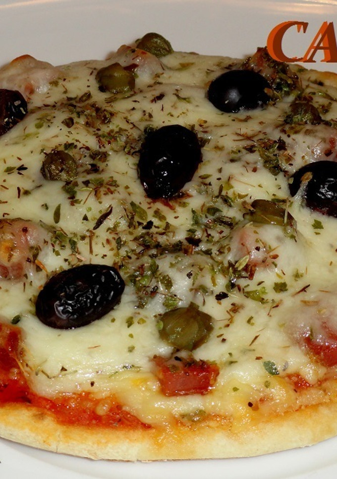Una foto de Minipizzetta de quesos y lomo ibérico