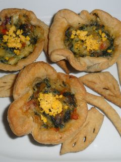 Una foto de Rosetas de hojaldre rellenas de acelga