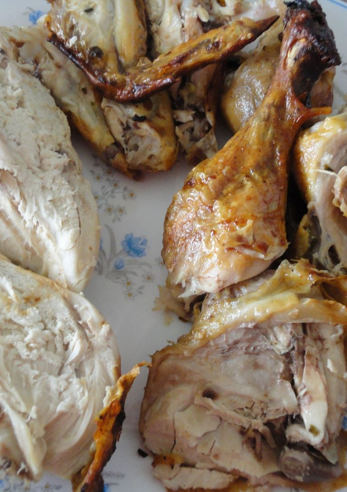 Una foto de Pollo sentado