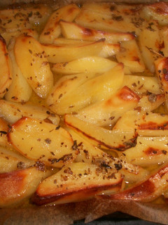 Una foto de Patatas asadas al limón griegas