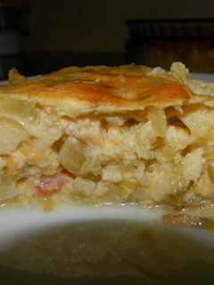 Una foto de Pastel de puerros, calabacín y gambas