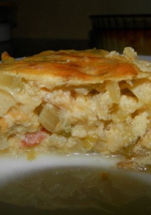 Una foto de Pastel de puerros, calabacín y gambas