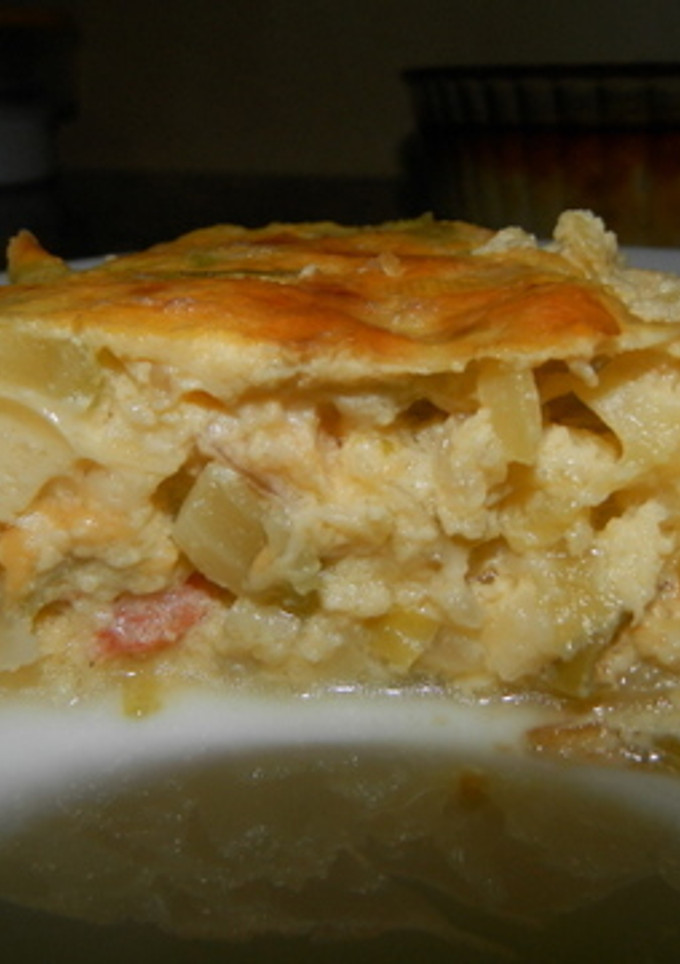 Una foto de Pastel de puerros, calabacín y gambas