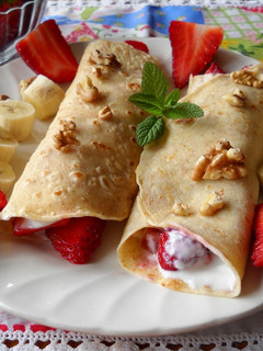 Una foto de Crepes integrales rellenas de queso