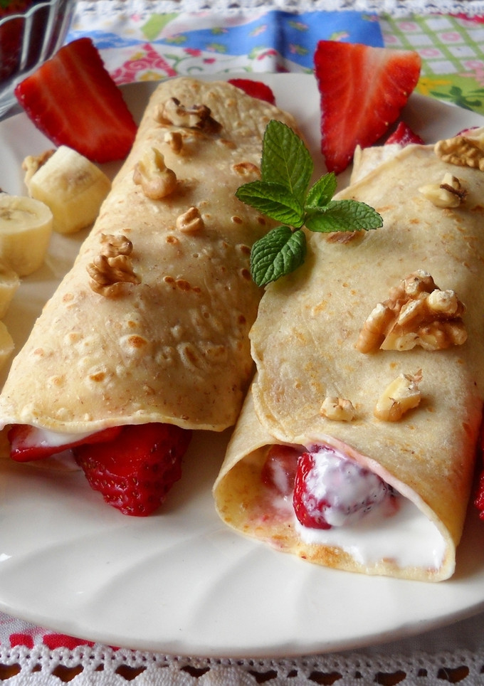 Una foto de Crepes integrales rellenas de queso