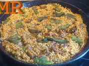 Una foto de paella pimiento choricero