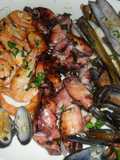 Mariscos a la plancha con salsa bearnesa