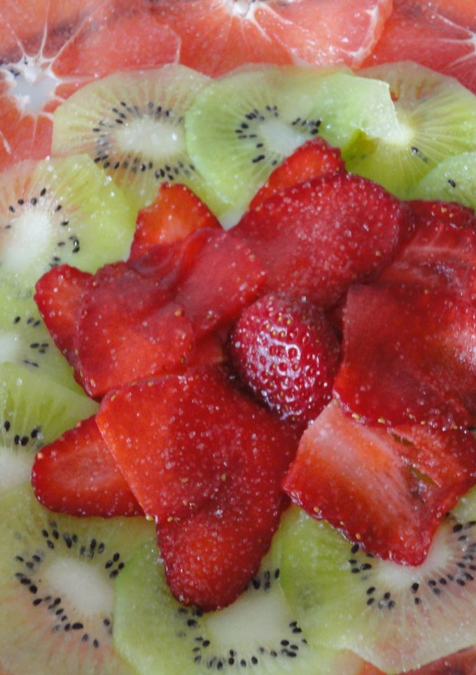 Una foto de Carpaccio de frutas a la vainilla