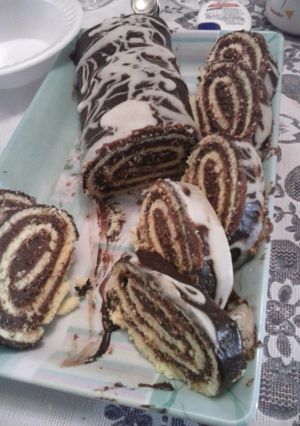 Una foto de Pionono de chocolate y dulce de leche