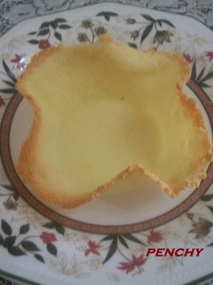 Una foto de Cómo hacer tulipas de queso rallado