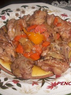 Una foto de Conejo con verduras en escabeche