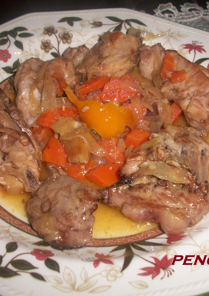 Una foto de Conejo con verduras en escabeche