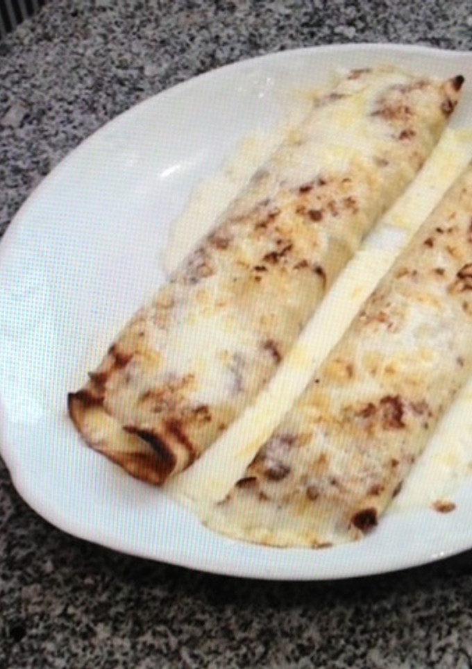 Una foto de Crepes rellenos de gambas, champiñones y bacon