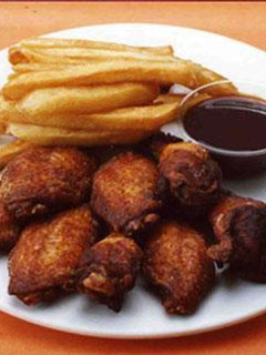 Una foto de Alas de pollo al ajillo